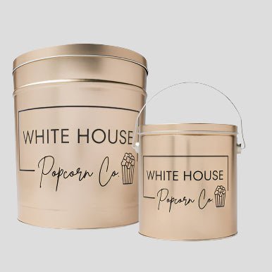 White House Popcorn Signature Metallic Gold Popcorn Tin. 1 Gallon & 3.5 Gallon Popcorn Tins. Available at Whitehousepopcorn.com.