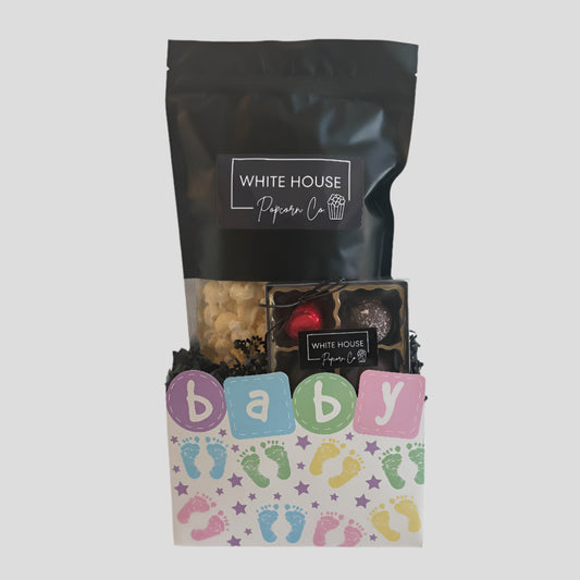 Baby Gift Basket with gourmet popcorn and chocolate at Whitehousepopcorn.com