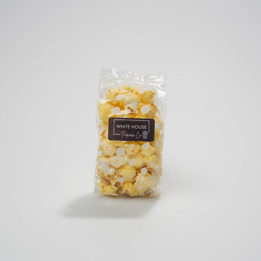White Polka Dot Mini Favor Popcorn Bag. Customize at whitehousepopcorn.com